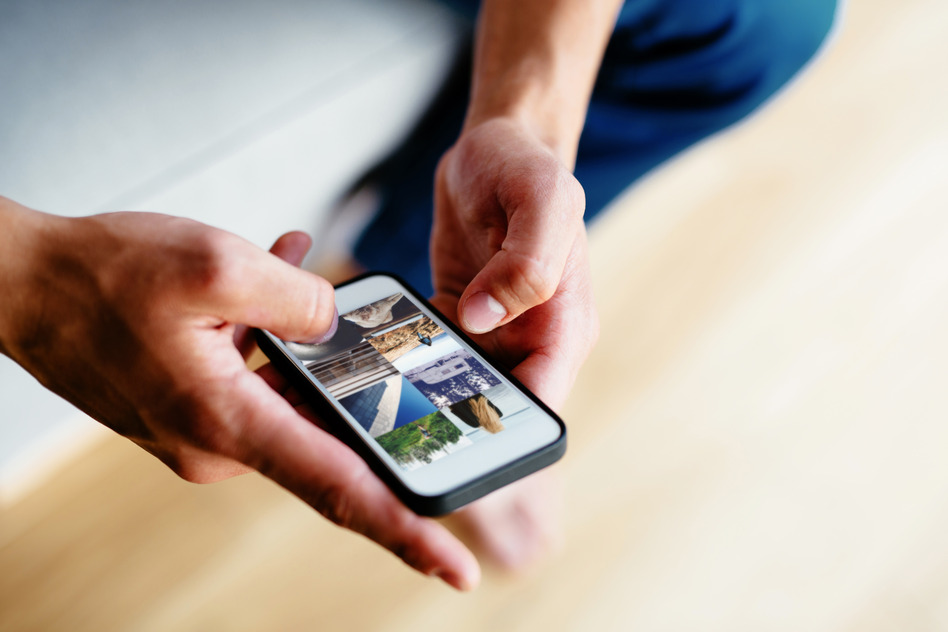Browsing social media on smartphone. Close-up
