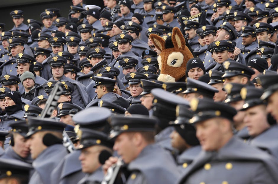 Donkey costume man in a sea of police officers. Why crowd sourced financial logos are a bad idea