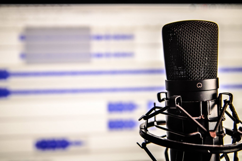 Picture of microphone, financial websites using audio marketing