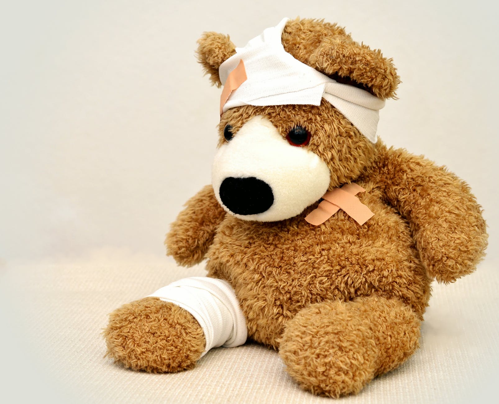 hurt teddy bear, showing how bad SEO can hurt financial websites
