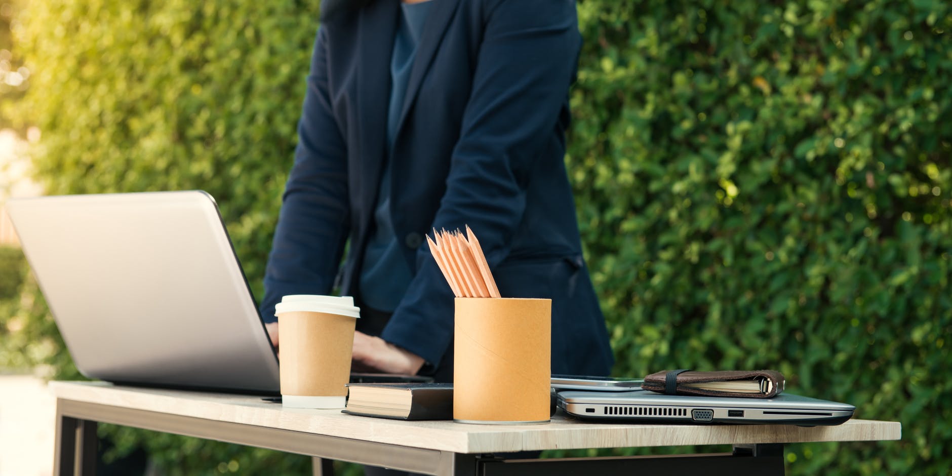 Picture of man on laptop pondering difference between financial branding and marketing