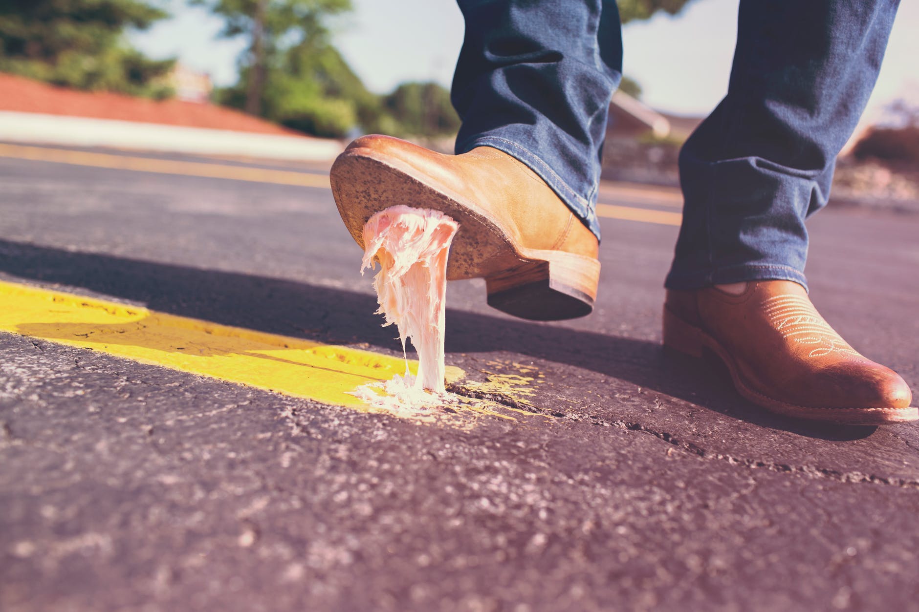 Man stepping on banana, illustrating mistakes with financial logo design