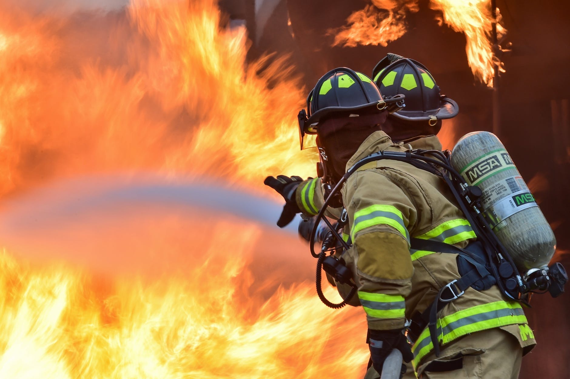 Firemen putting out a fire, symbolising financial websites and GDPr panic!